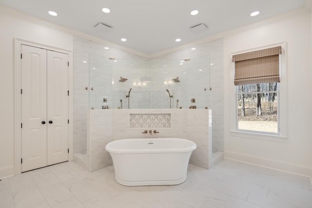 bathroom featuring marble finish floor, ornamental molding, and a marble finish shower