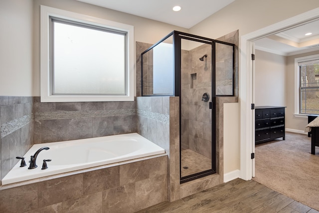 full bathroom featuring a stall shower, recessed lighting, a garden tub, and crown molding