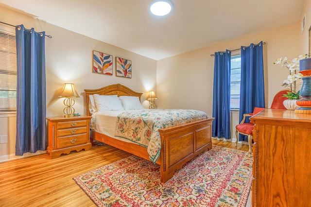 bedroom with light wood-style flooring