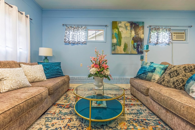 living room featuring an AC wall unit