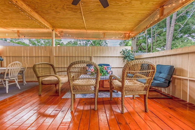 exterior space with wooden ceiling, a ceiling fan, and a healthy amount of sunlight