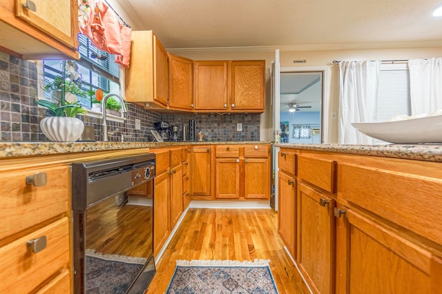 kitchen featuring ornamental molding, brown cabinets, dishwasher, light wood finished floors, and tasteful backsplash