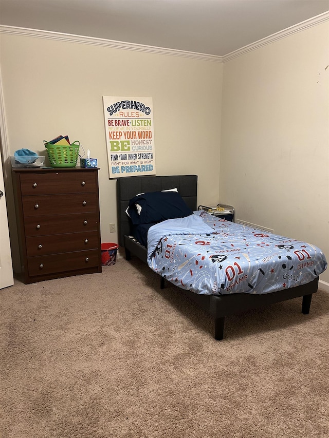 bedroom featuring carpet floors and crown molding