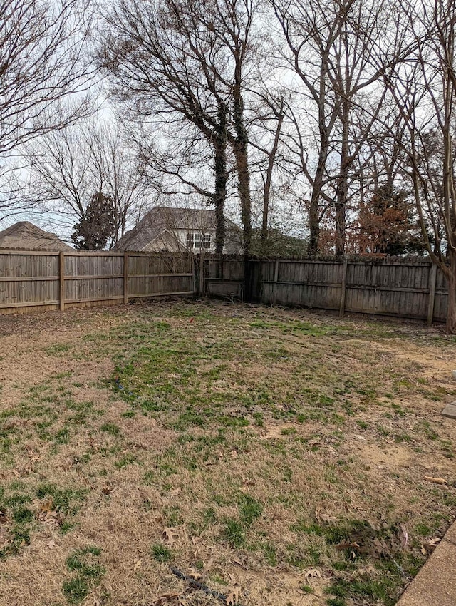 view of yard featuring a fenced backyard