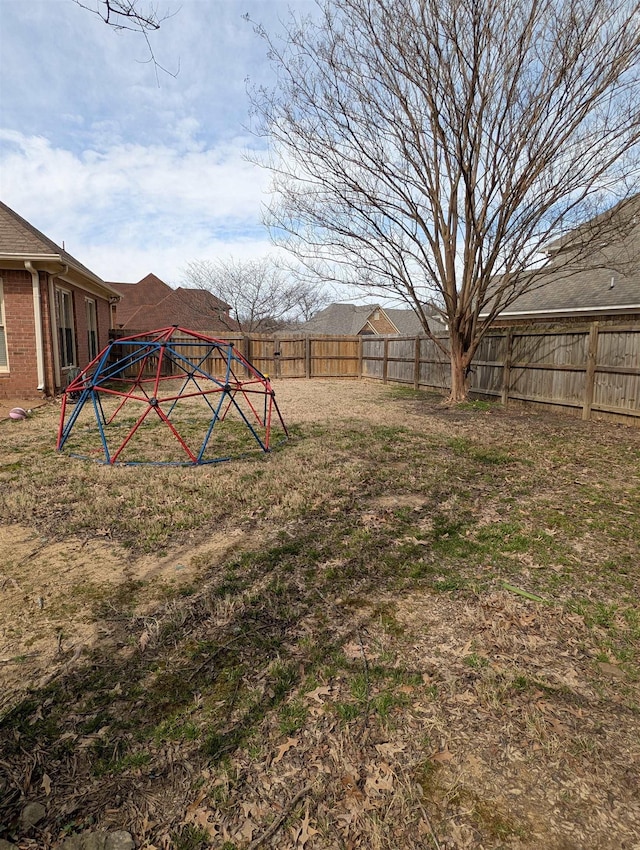 view of yard with a fenced backyard