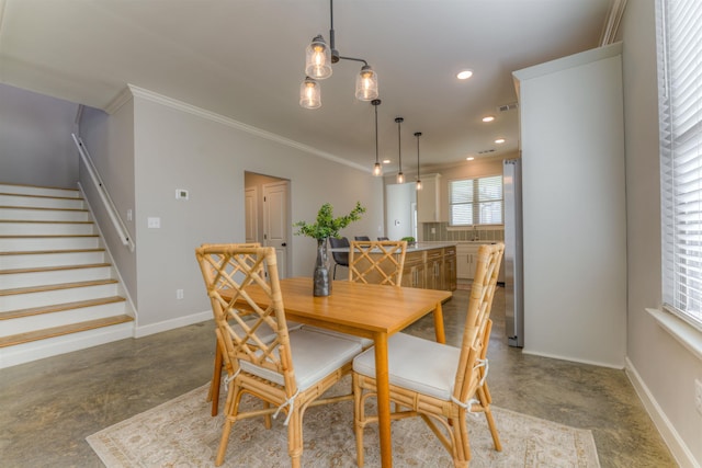 dining space with stairs, baseboards, concrete flooring, and recessed lighting