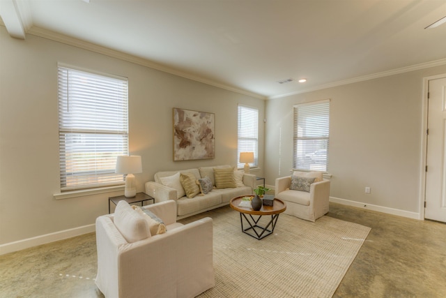 living room featuring baseboards, visible vents, and crown molding