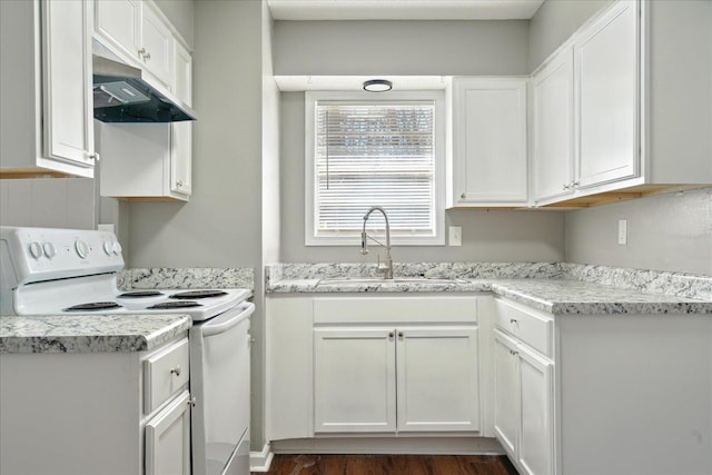 kitchen with white cabinetry, a sink, under cabinet range hood, and white range with electric cooktop