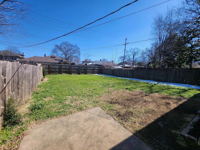 view of yard featuring a fenced backyard