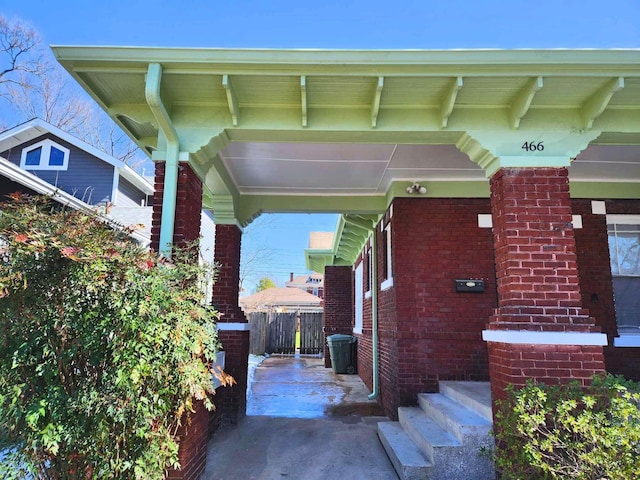 view of property exterior featuring brick siding