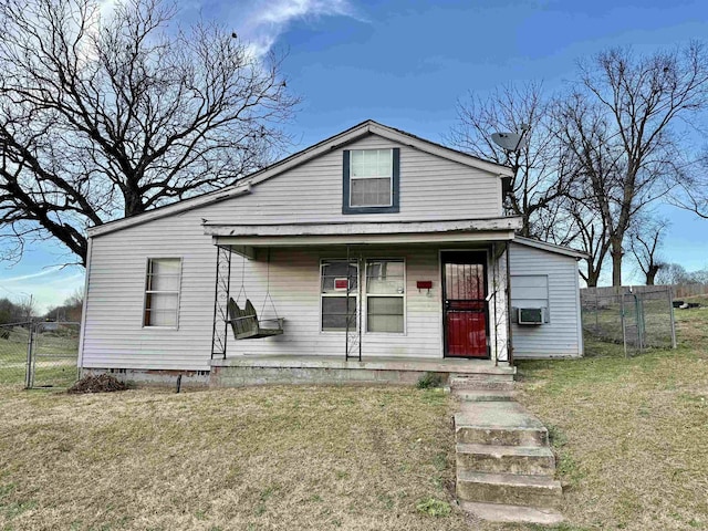 view of front of house featuring crawl space, covered porch, a gate, fence, and a front yard