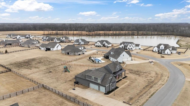 aerial view with a water view and a residential view