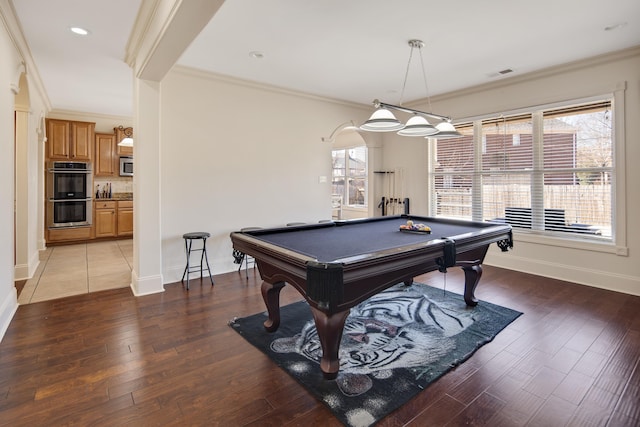 recreation room featuring visible vents, baseboards, light wood-style flooring, ornamental molding, and pool table