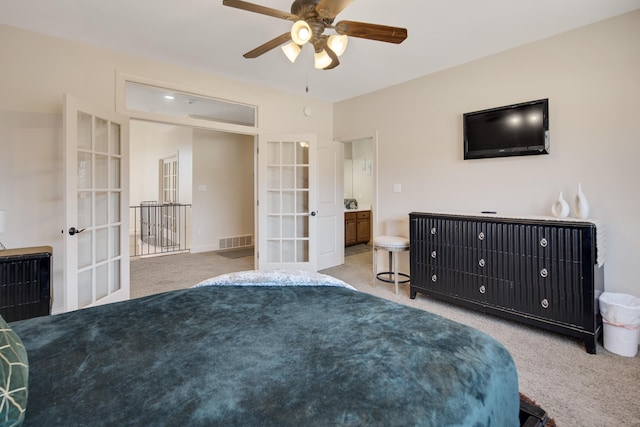 bedroom featuring french doors, carpet flooring, ceiling fan, and visible vents