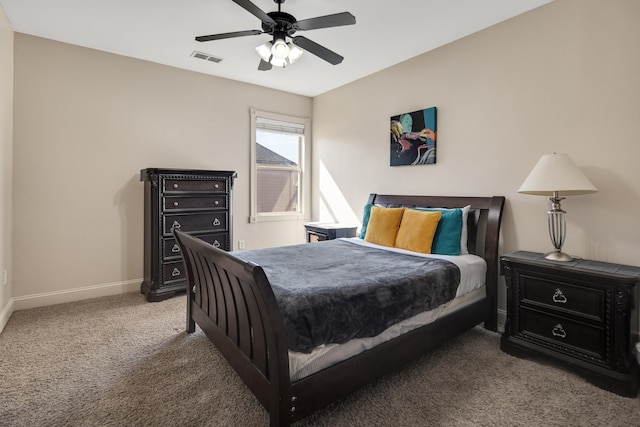 bedroom featuring a ceiling fan, carpet, visible vents, and baseboards