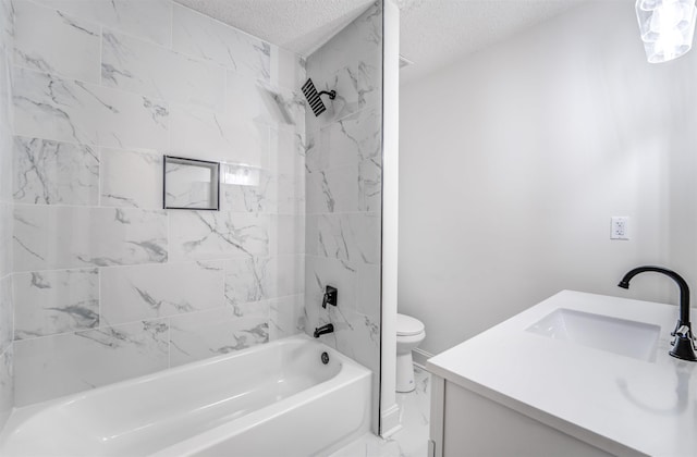 bathroom featuring a textured ceiling, bathtub / shower combination, toilet, vanity, and marble finish floor