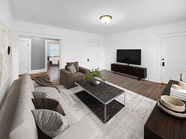 living room featuring baseboards and wood finished floors