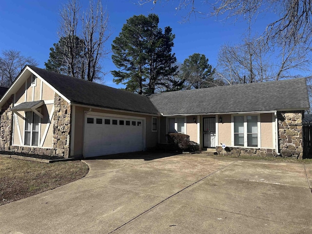 ranch-style house featuring roof with shingles, stucco siding, concrete driveway, an attached garage, and stone siding