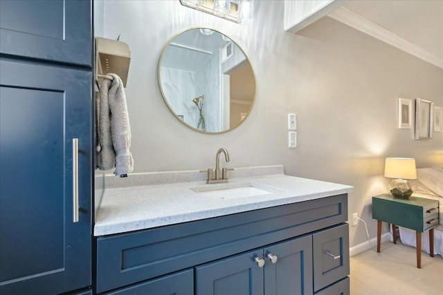 bathroom featuring visible vents, ornamental molding, vanity, and baseboards