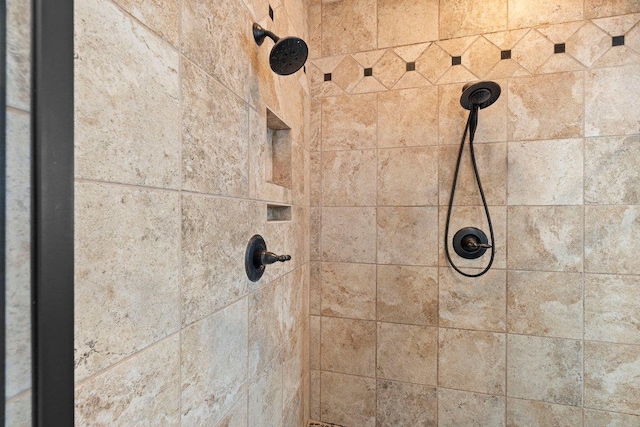 room details with a tile shower