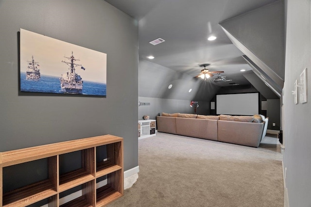 carpeted cinema featuring lofted ceiling, ceiling fan, recessed lighting, visible vents, and baseboards