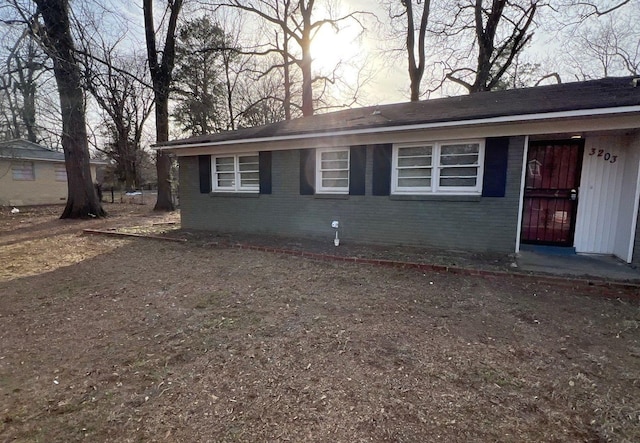 view of front of property with brick siding