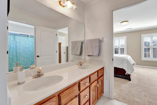 bathroom with double vanity, a sink, connected bathroom, and crown molding