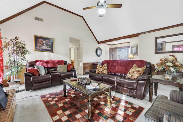 living area featuring carpet floors, ornamental molding, high vaulted ceiling, and visible vents