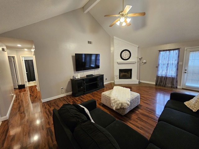 living area with high vaulted ceiling, a fireplace, wood finished floors, visible vents, and beam ceiling