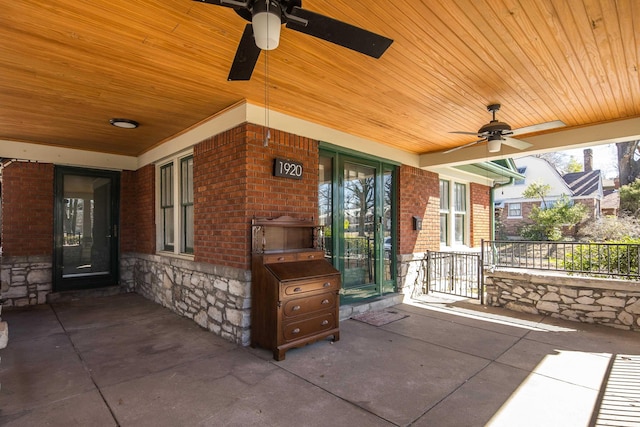 view of patio with covered porch and ceiling fan