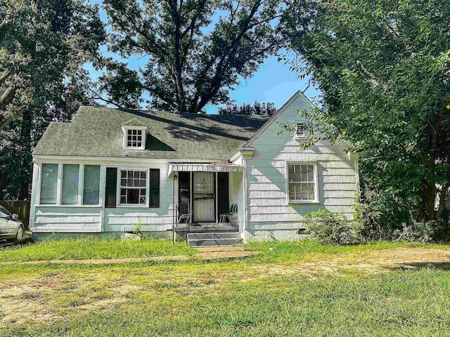 view of front of house featuring a front yard