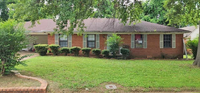 single story home with a front lawn and brick siding