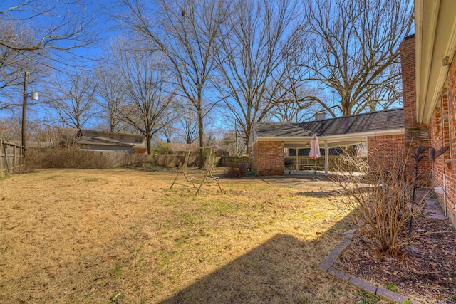 view of yard with a fenced backyard and a patio