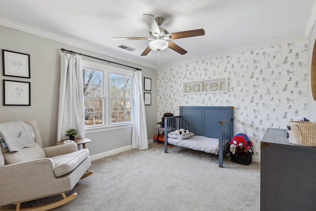 carpeted bedroom with wallpapered walls, visible vents, a textured ceiling, and ornamental molding