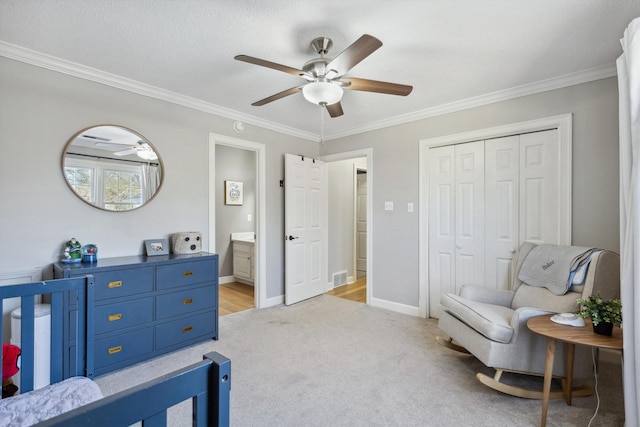 bedroom with light carpet, baseboards, visible vents, crown molding, and a closet