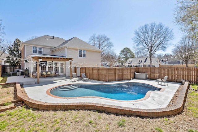 view of pool with a patio area, a fenced backyard, and a fenced in pool