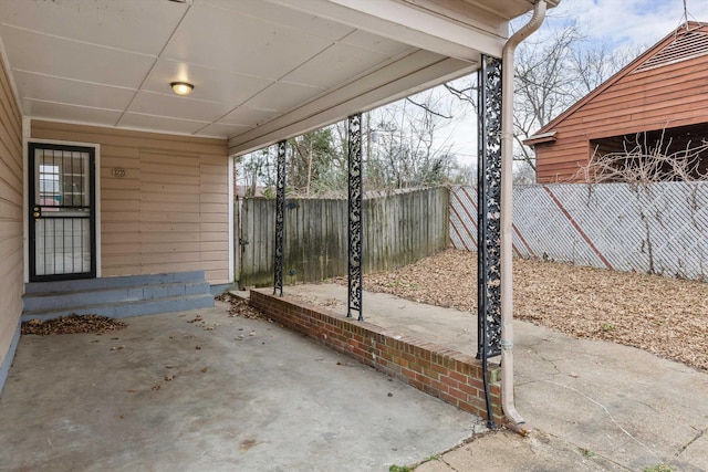 view of patio with fence