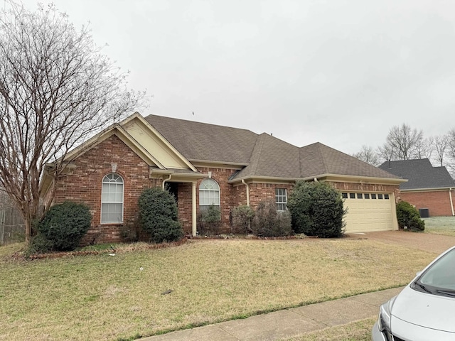 single story home with brick siding, roof with shingles, concrete driveway, an attached garage, and a front lawn