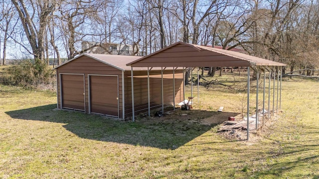 view of outdoor structure with a carport and an outdoor structure