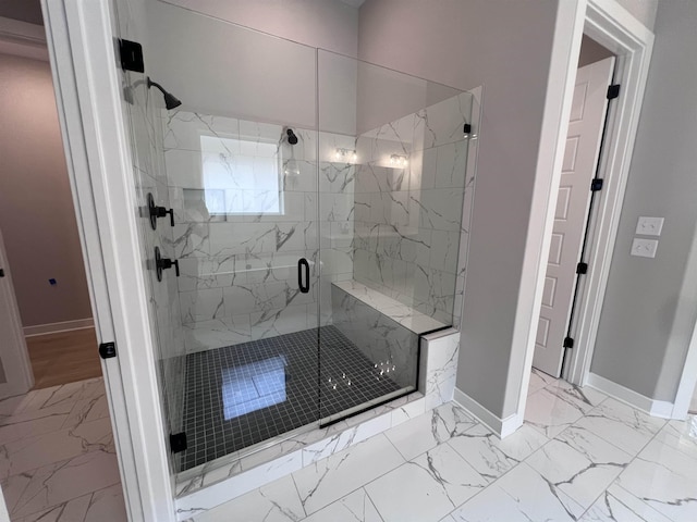 10264 Liam Ln, Collierville, TN 38017 - bathroom with marble finish flooring, a marble finish shower, and baseboards