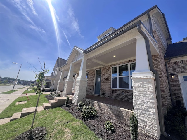 10264 Liam Ln, Collierville, TN 38017 - view of home's exterior with brick siding and covered porch