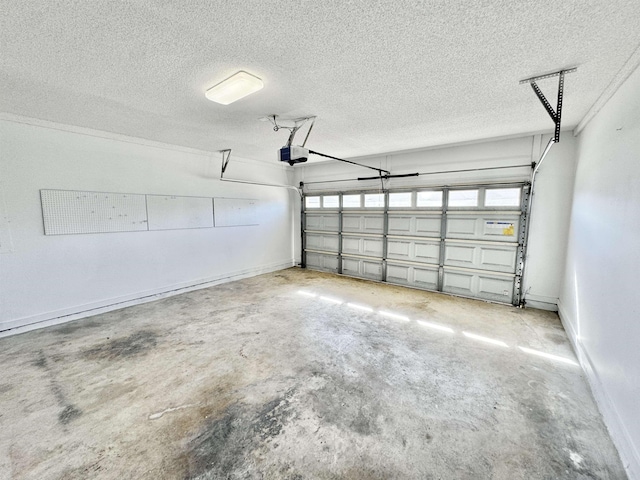 garage with a garage door opener and baseboards