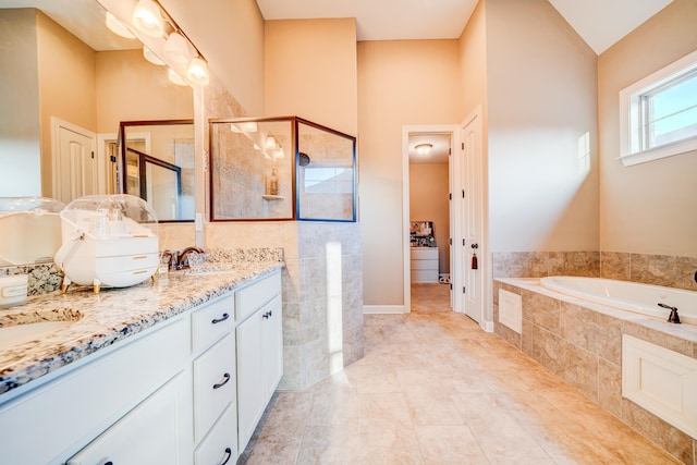 full bathroom with double vanity, visible vents, a stall shower, a sink, and a bath