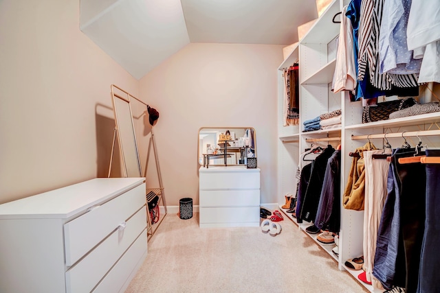 spacious closet featuring carpet and lofted ceiling