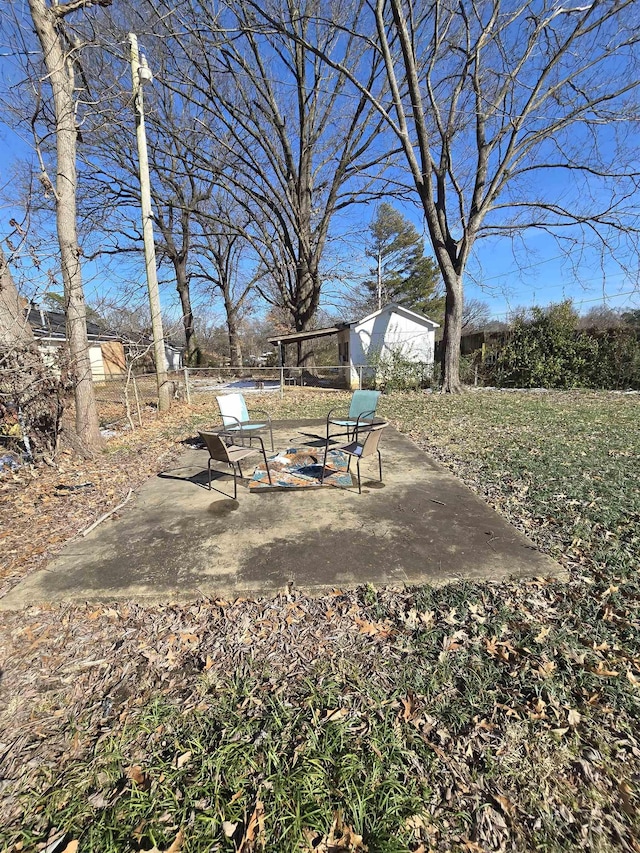 view of property's community with a patio area