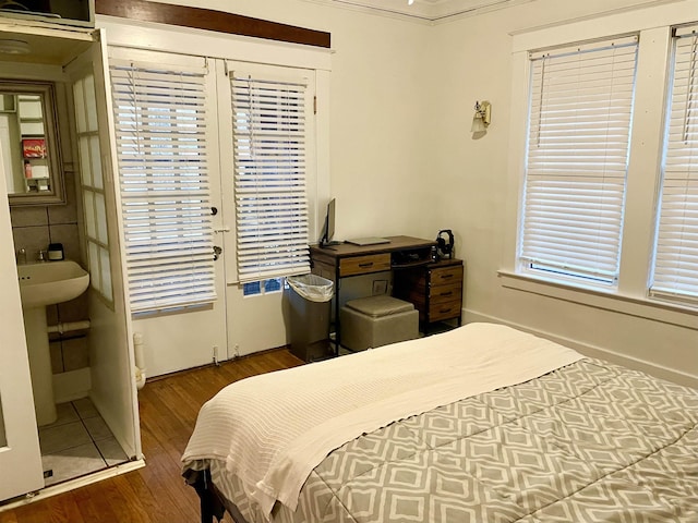 bedroom with wood finished floors