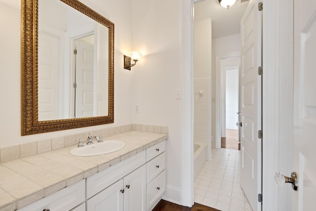 full bathroom featuring vanity