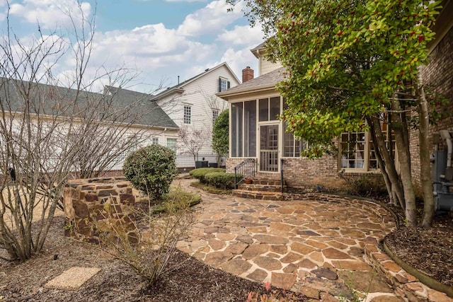 exterior space with a sunroom