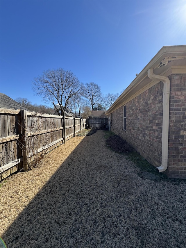 view of yard featuring a fenced backyard