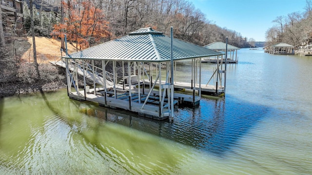 view of dock with a water view